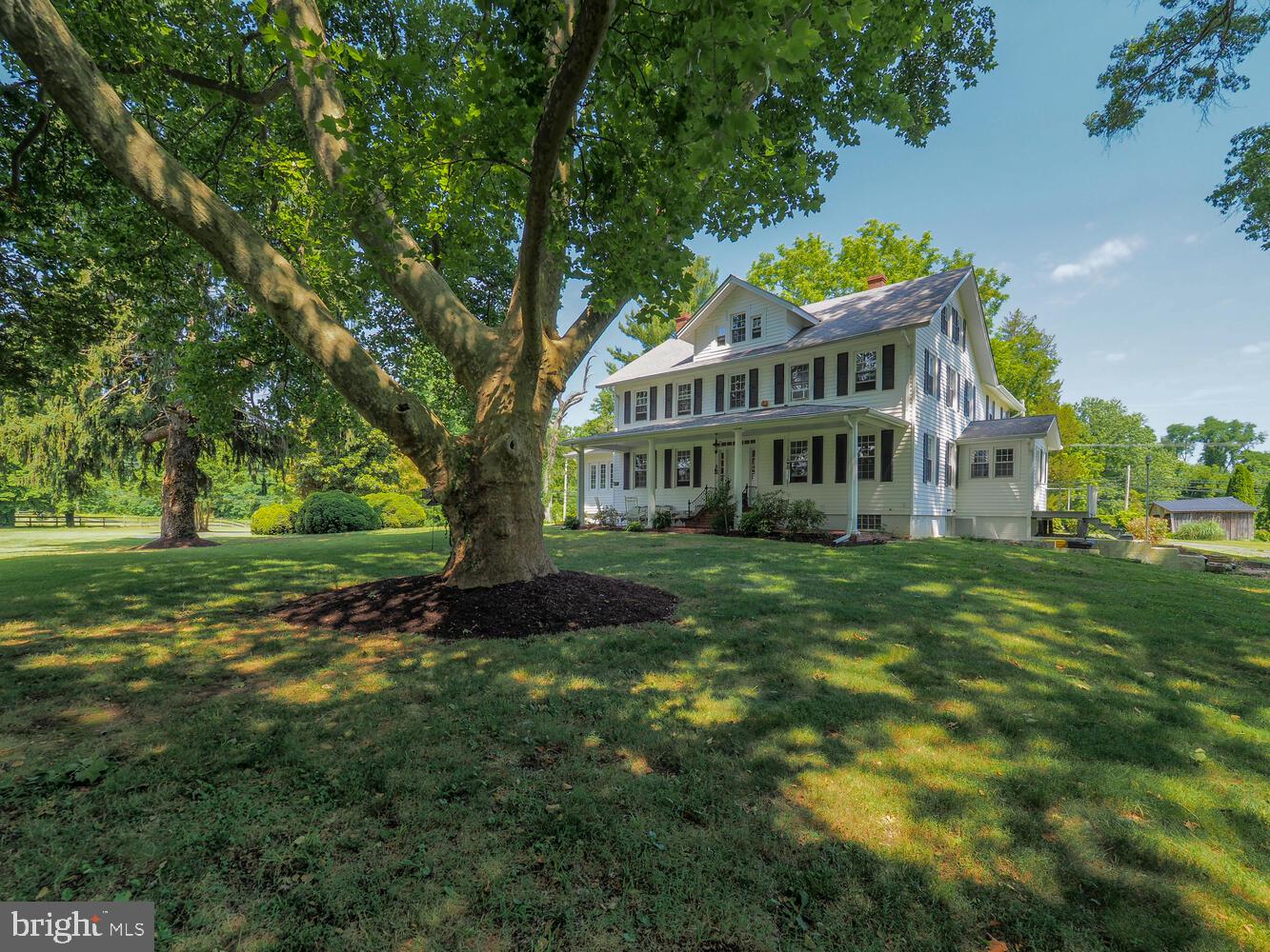 a view of a house with a big yard