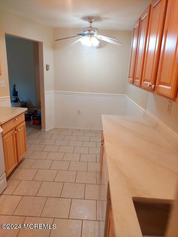 a view of a livingroom with an empty space and a fireplace