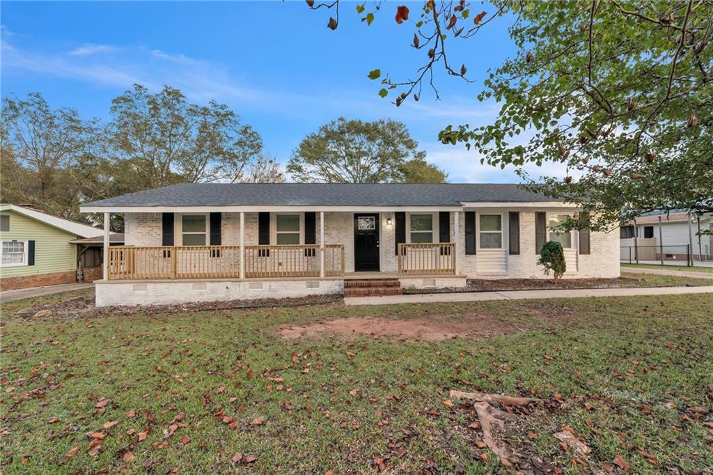 front view of a house with a big yard