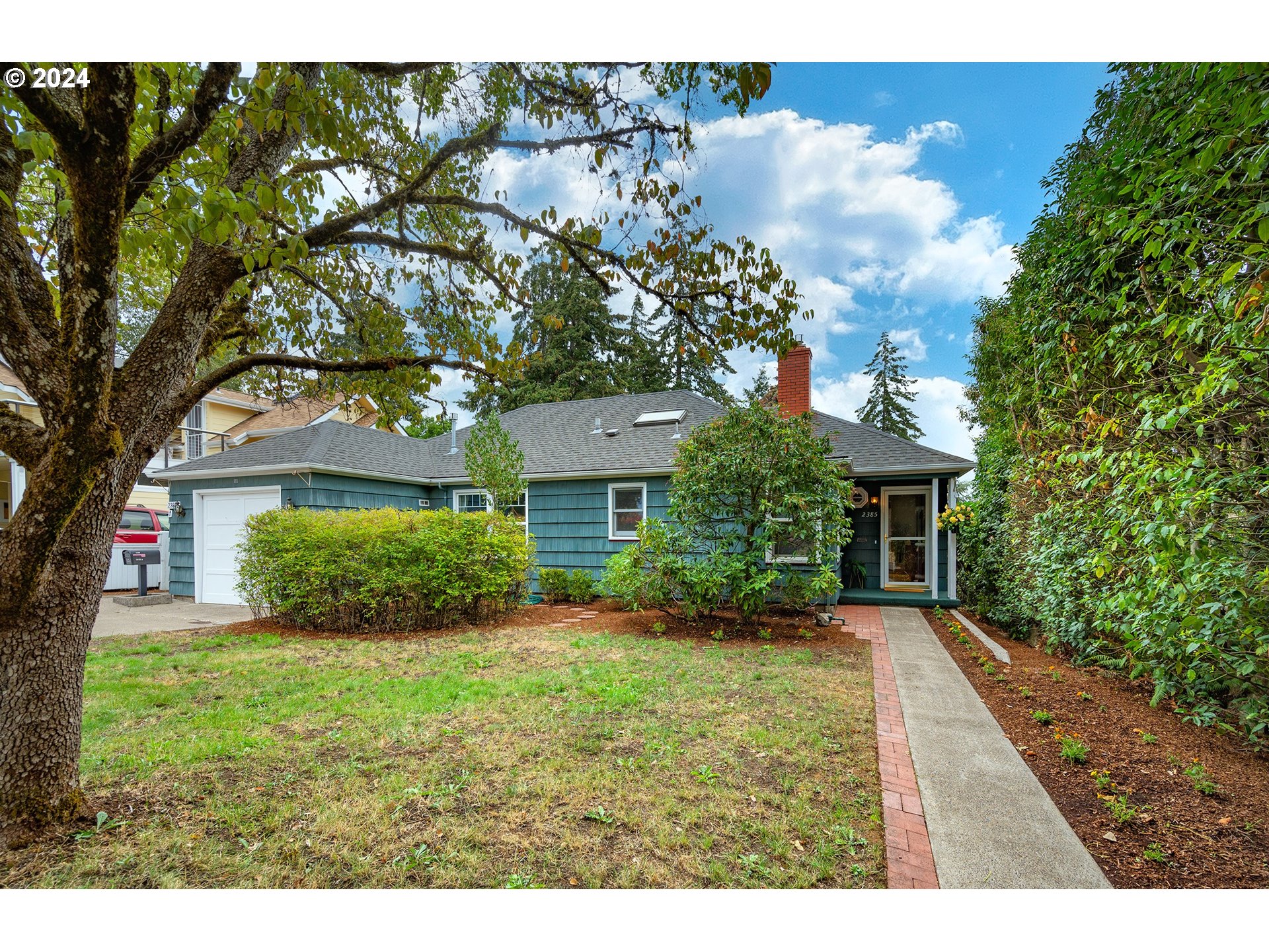 a house view with a garden space