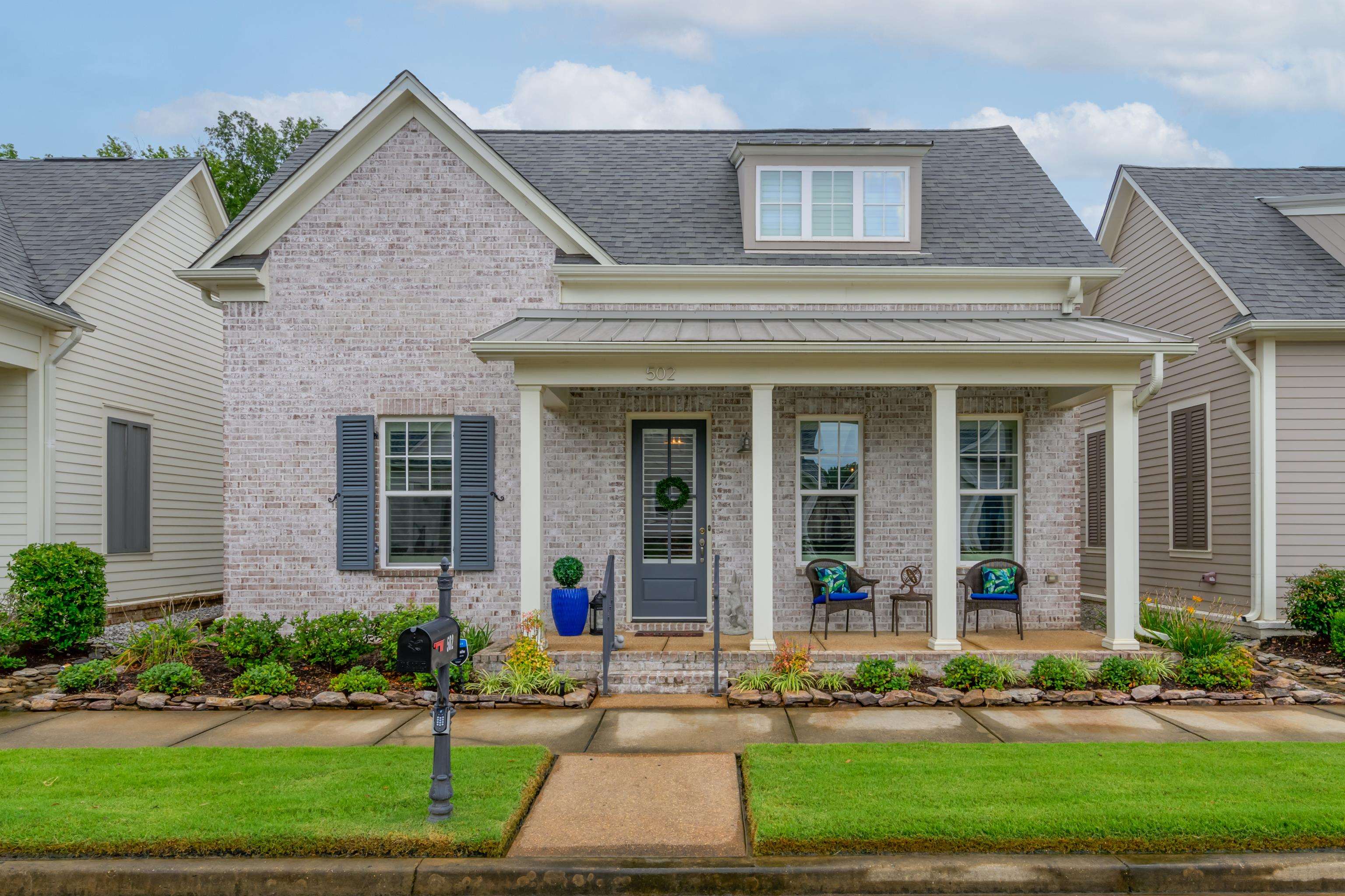 View of front of house featuring covered porch