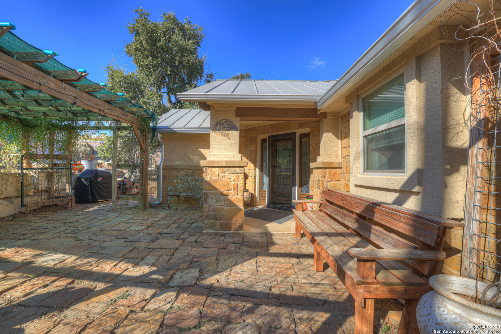 a front view of a house with a outdoor space