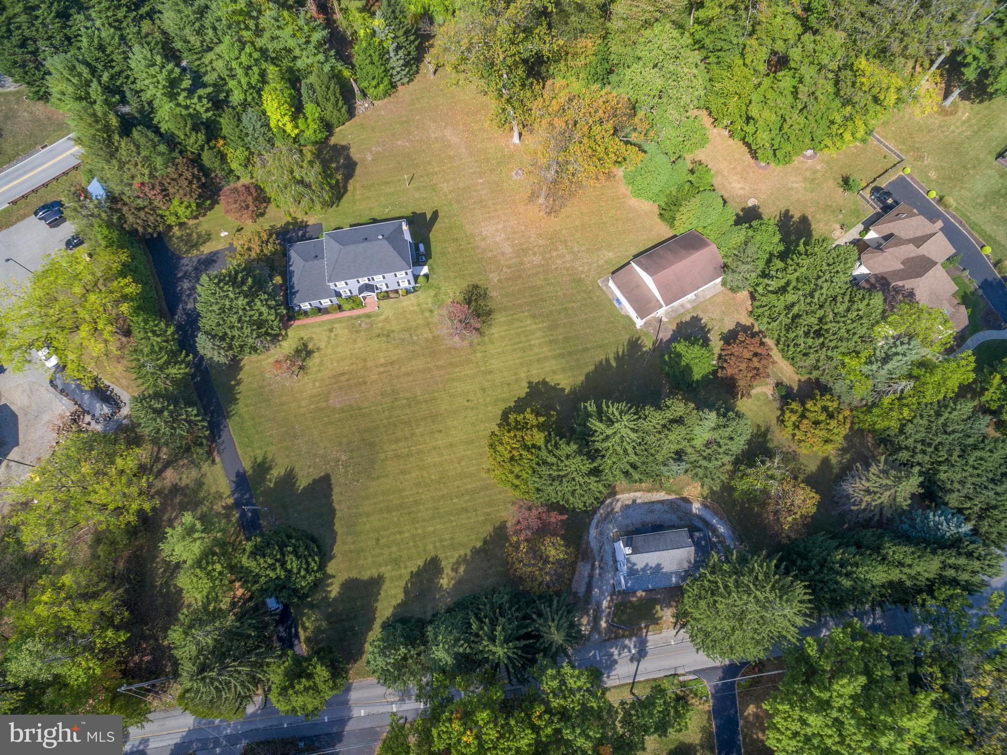 an aerial view of residential house with outdoor space