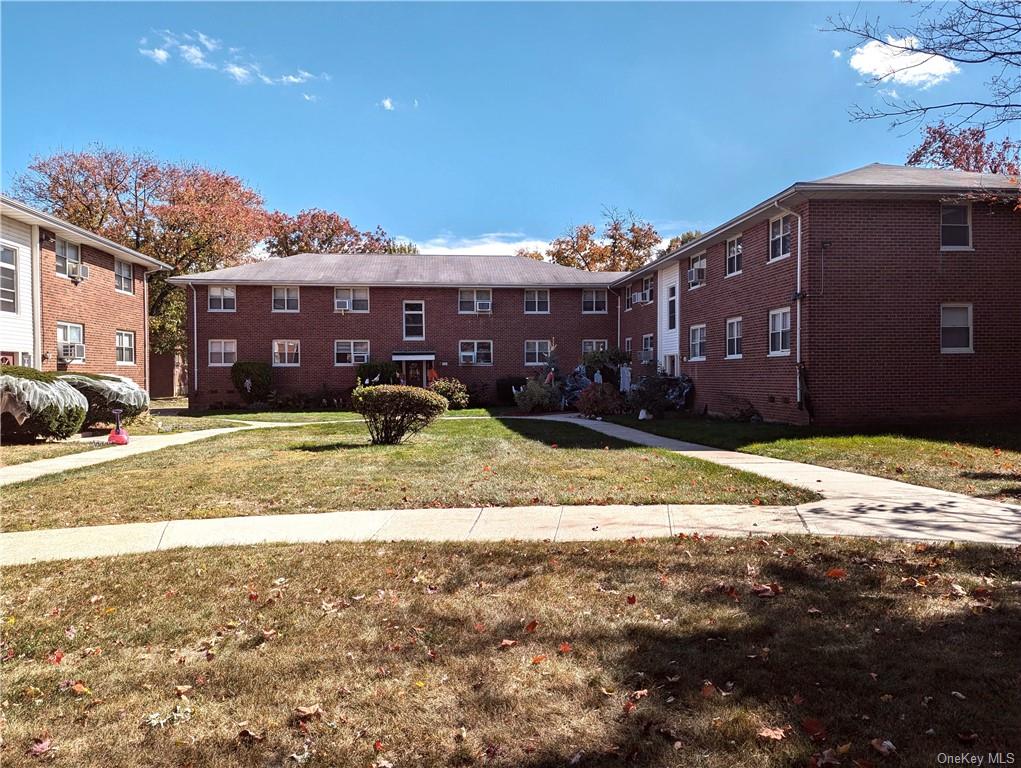 View of entry courtyard. Unit fully painted