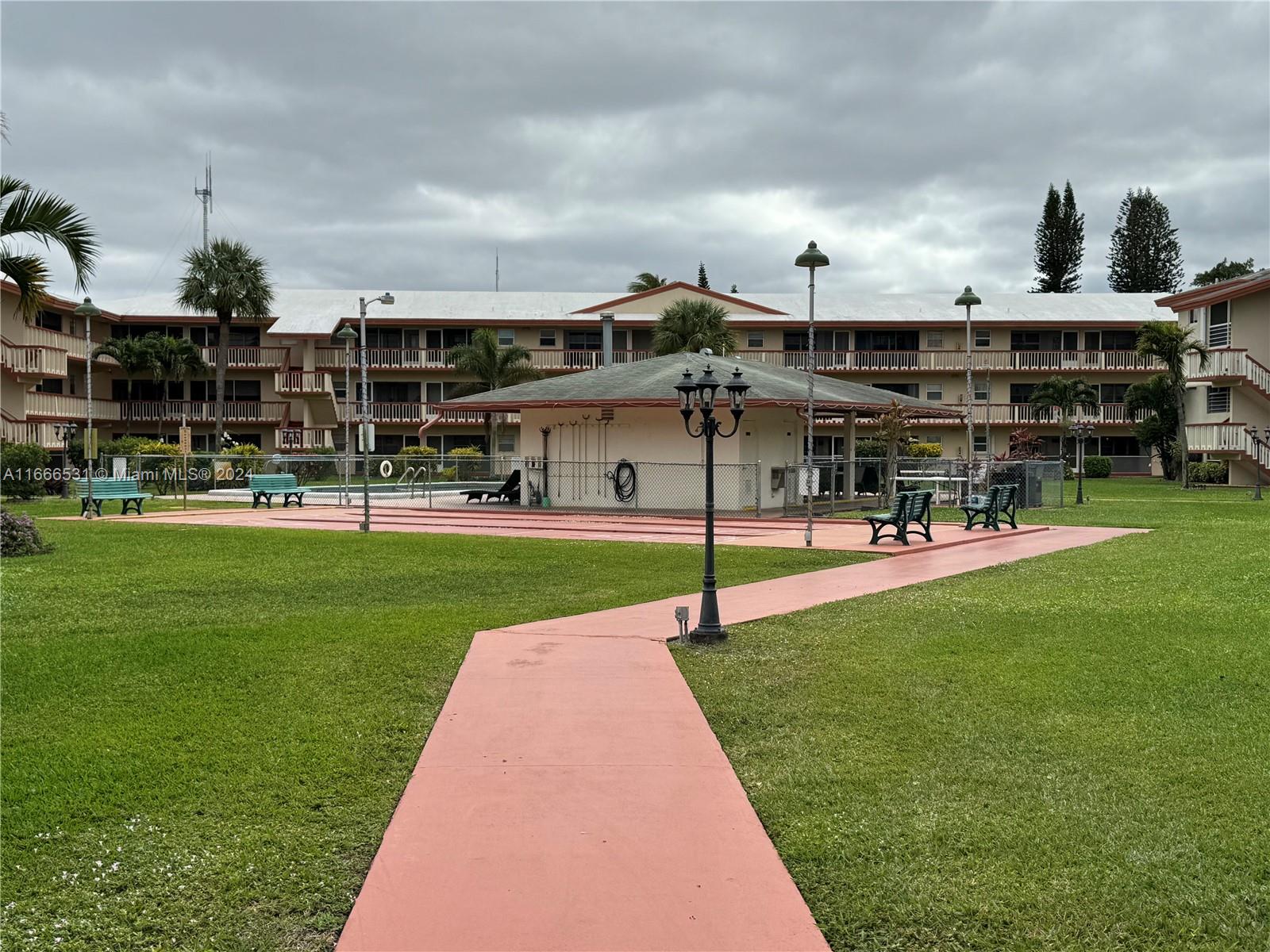 a childrens park with lots of swings and slides