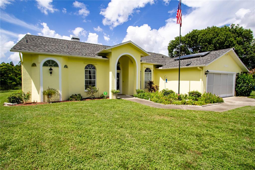 a view of a house with a swimming pool