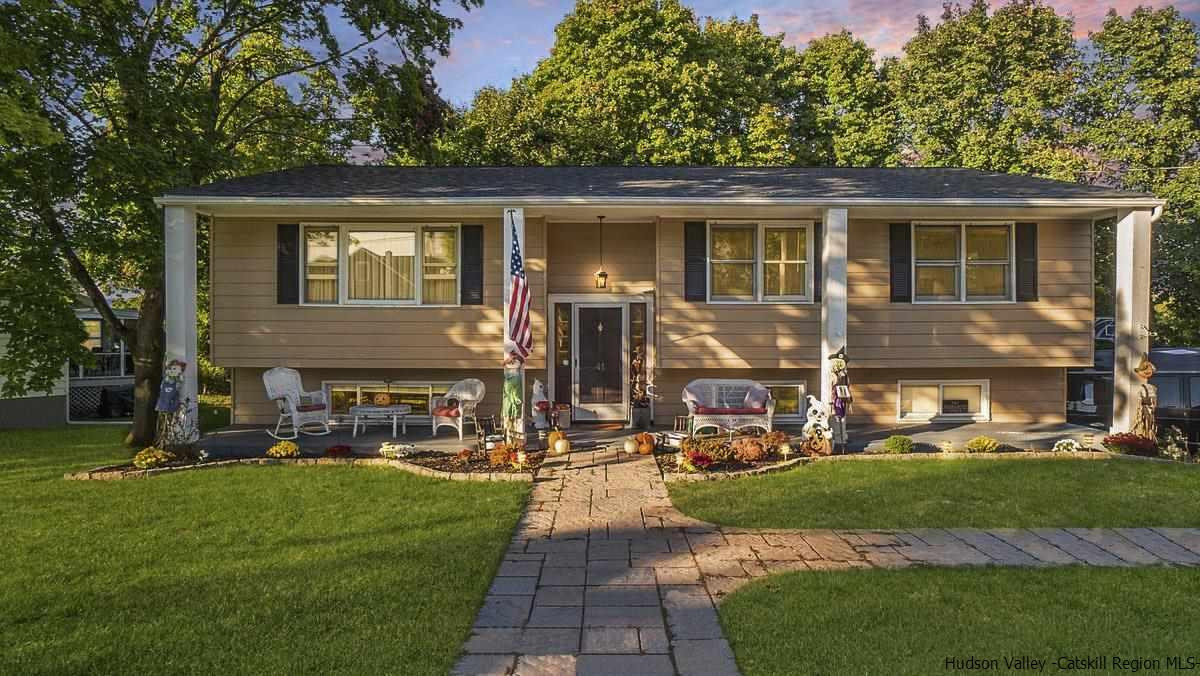 front view of a house with a yard