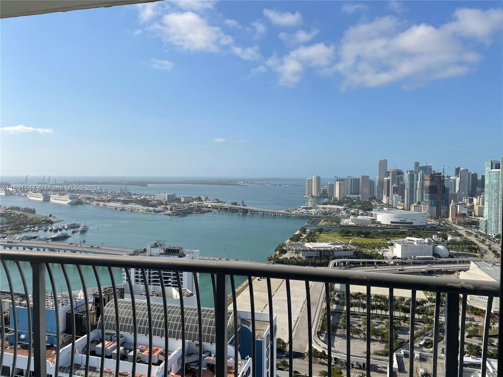 a view of a balcony with city