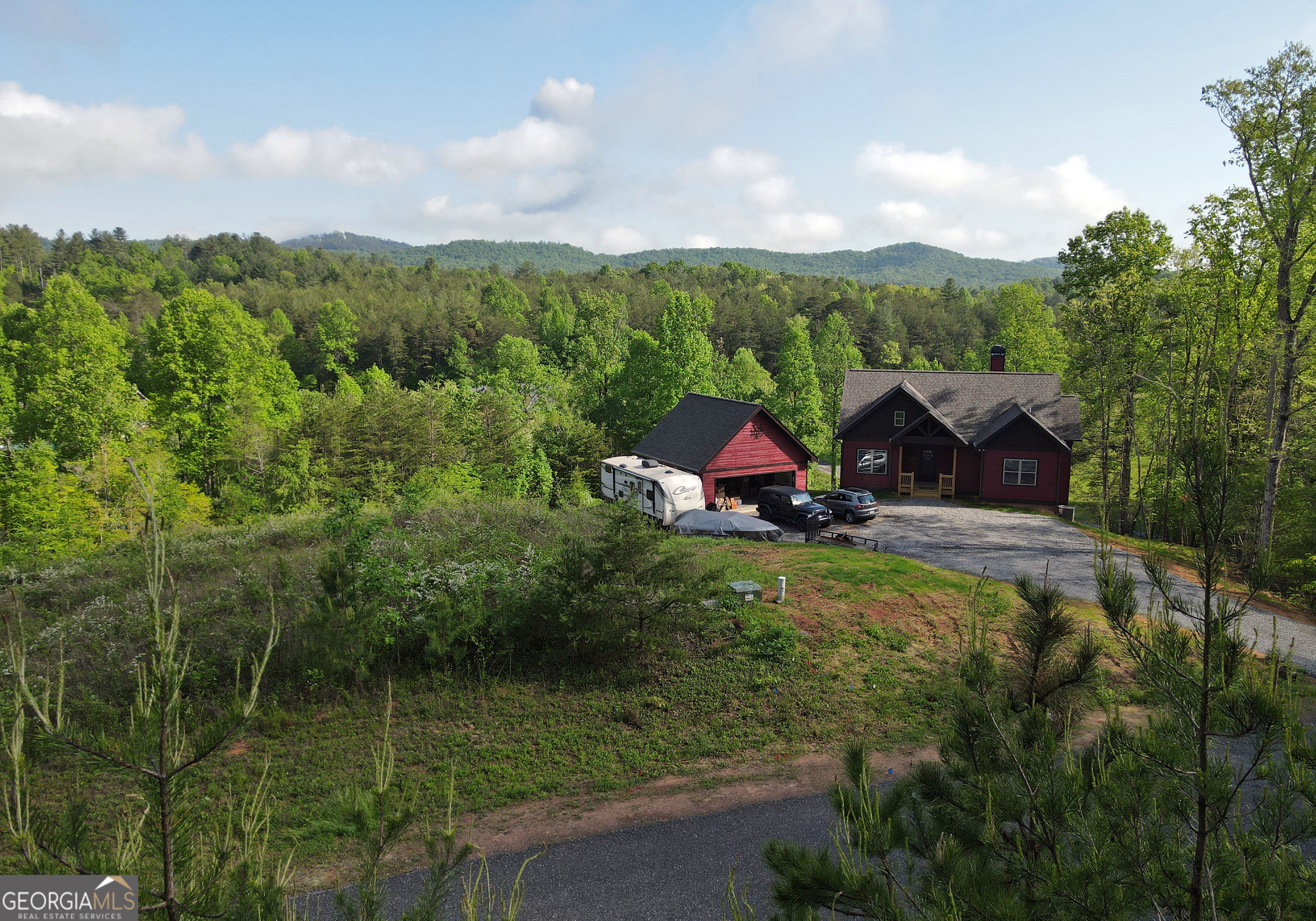 a view of a house with a yard