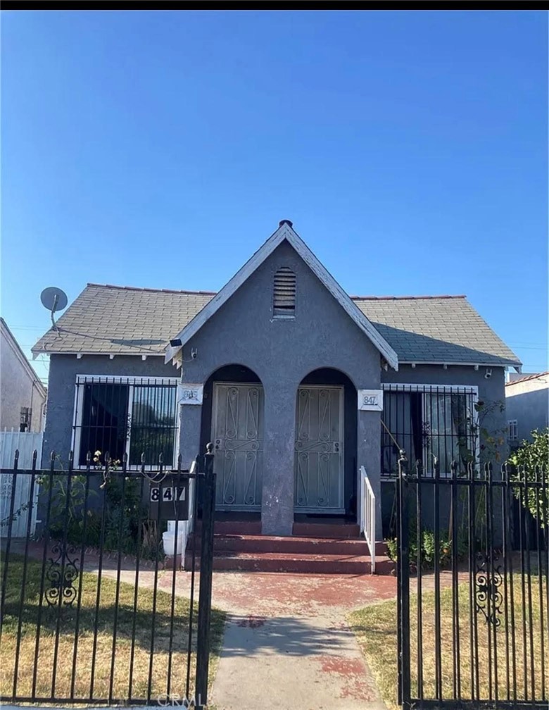 a front view of house yard and deck