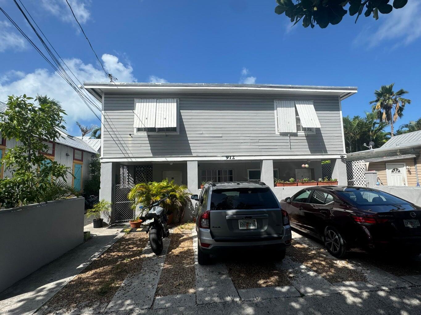 a car parked in front of a house