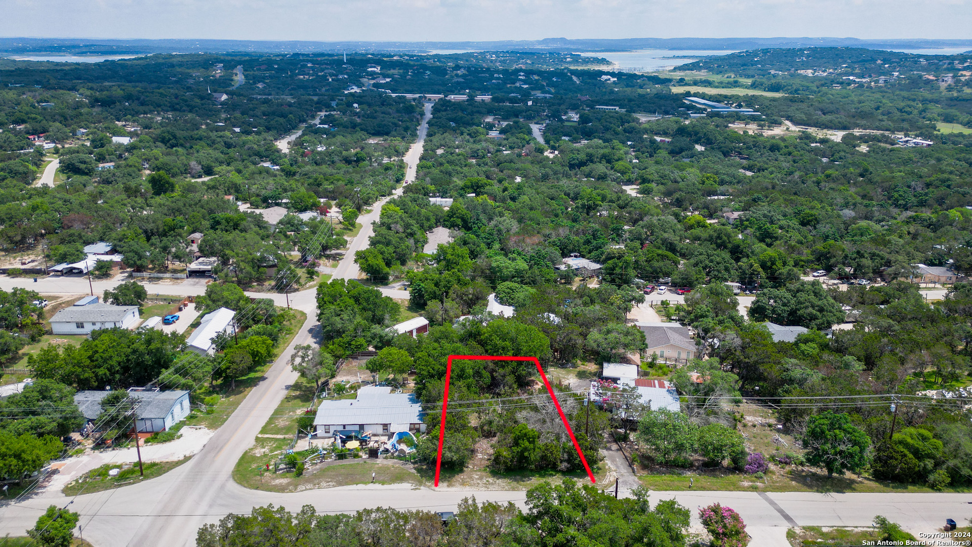 an aerial view of residential house and outdoor space