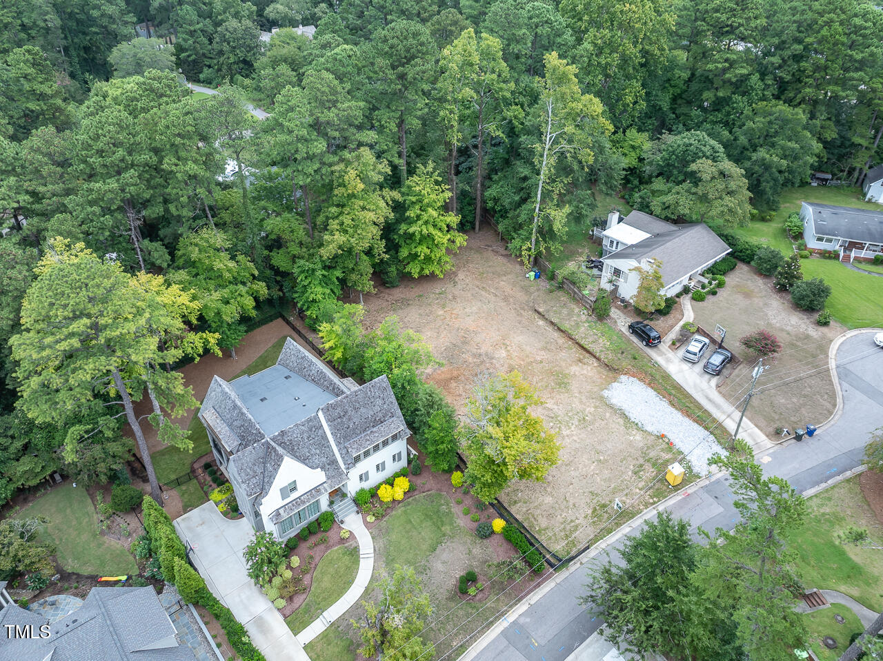 an aerial view of a house with a garden