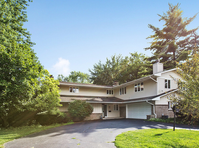 a view of house with outdoor space