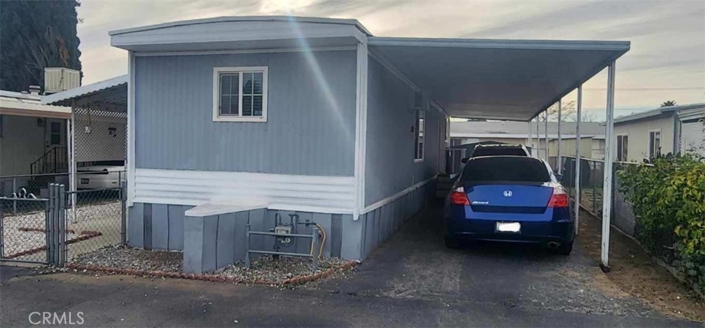 a view of a car in front of house