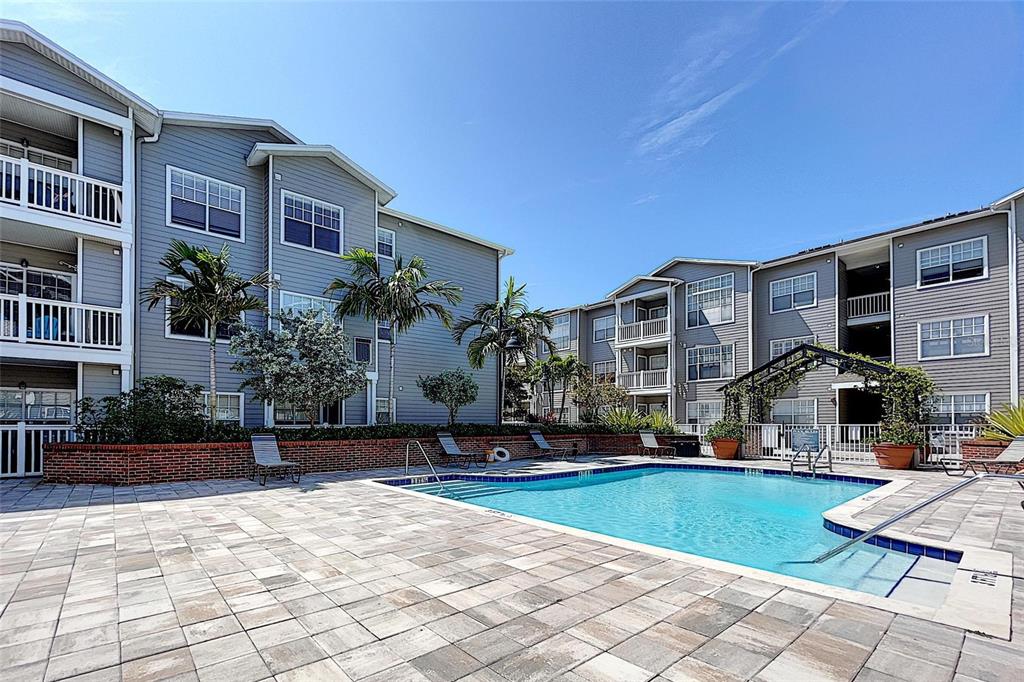 a front view of a house with swimming pool