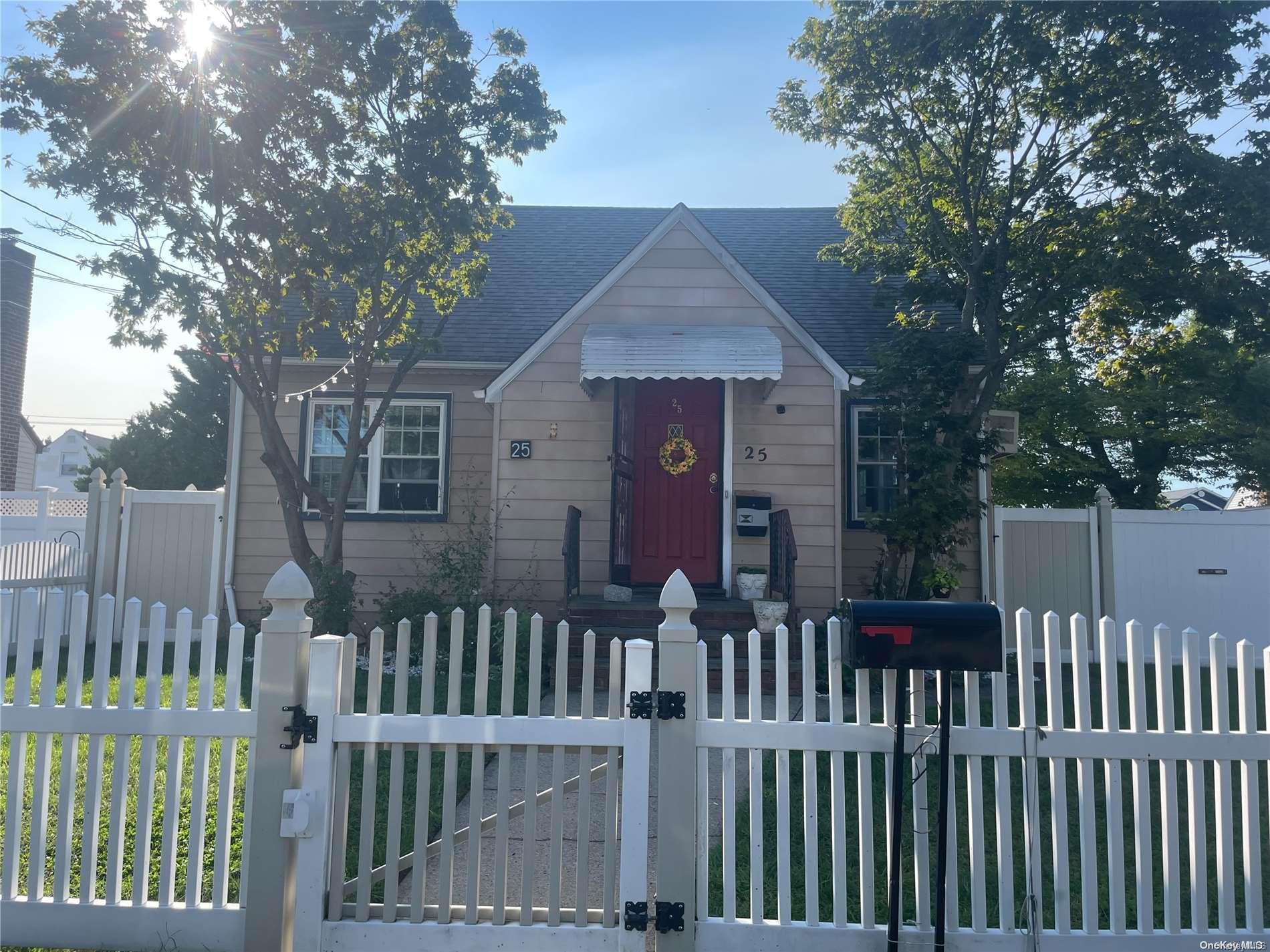 a view of a house with a small yard