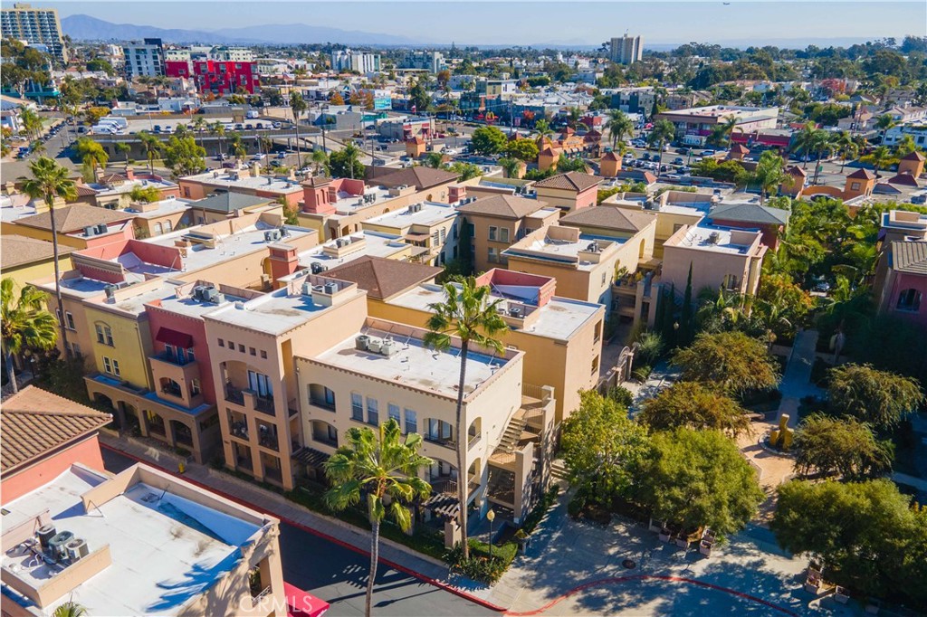 an aerial view of a building with outdoor space