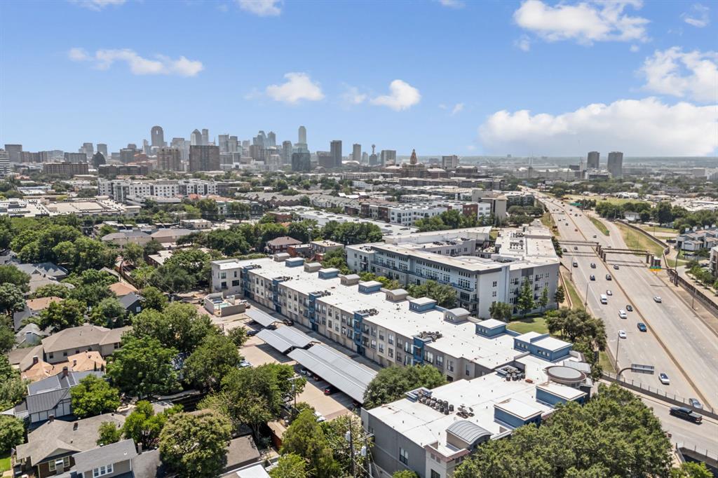 an aerial view of a city with lots of residential buildings