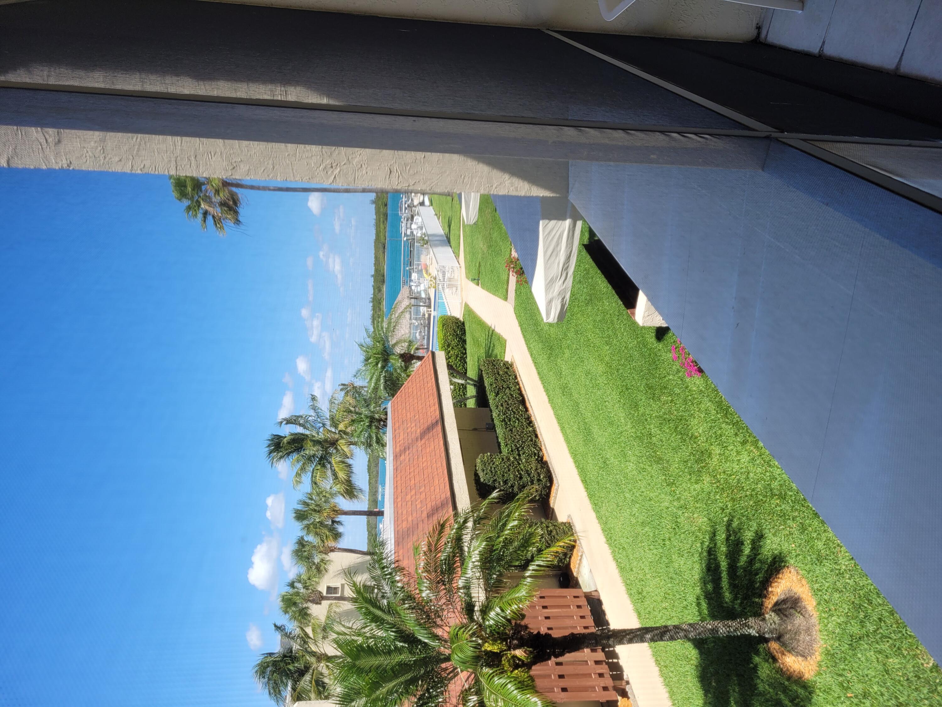 a view of a garden from a balcony