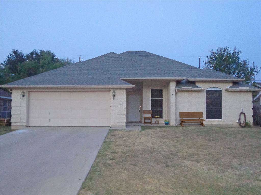 front view of a house with yard