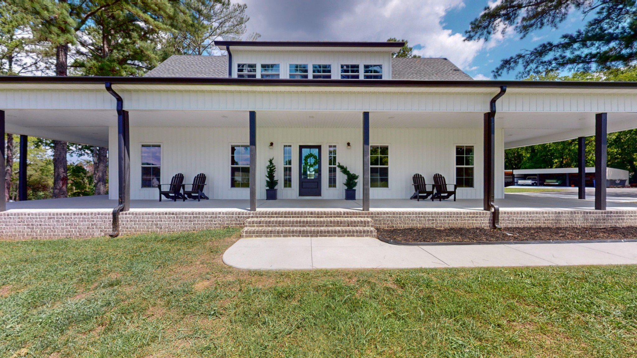 front view of a house with a yard