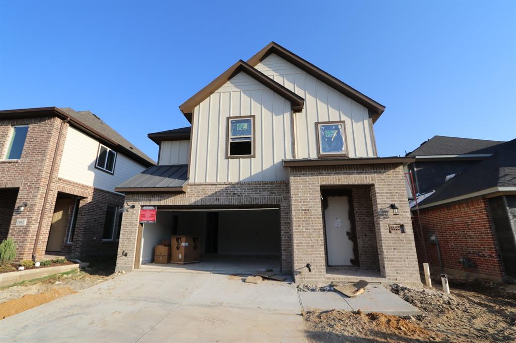 a front view of a house with parking