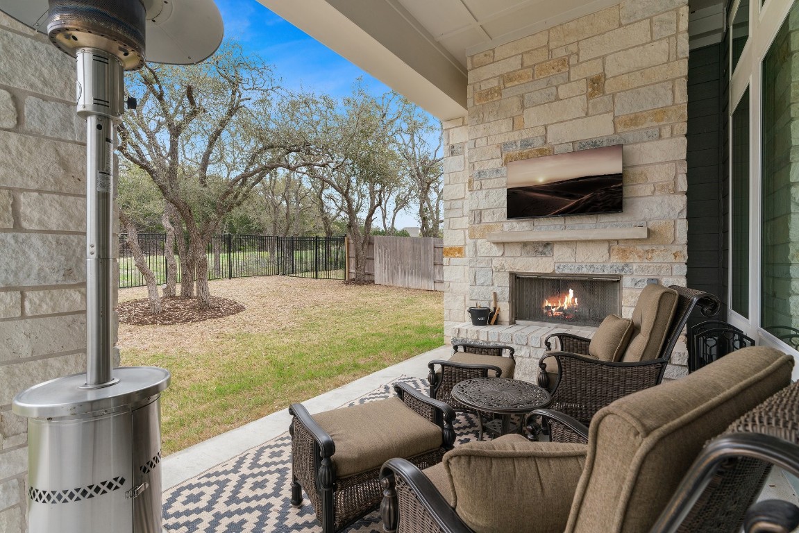 Enjoy Headwaters' resort-style amenities by day and gather around this cozy wood-burning fireplace in the evenings surrounded by nature's serene views.