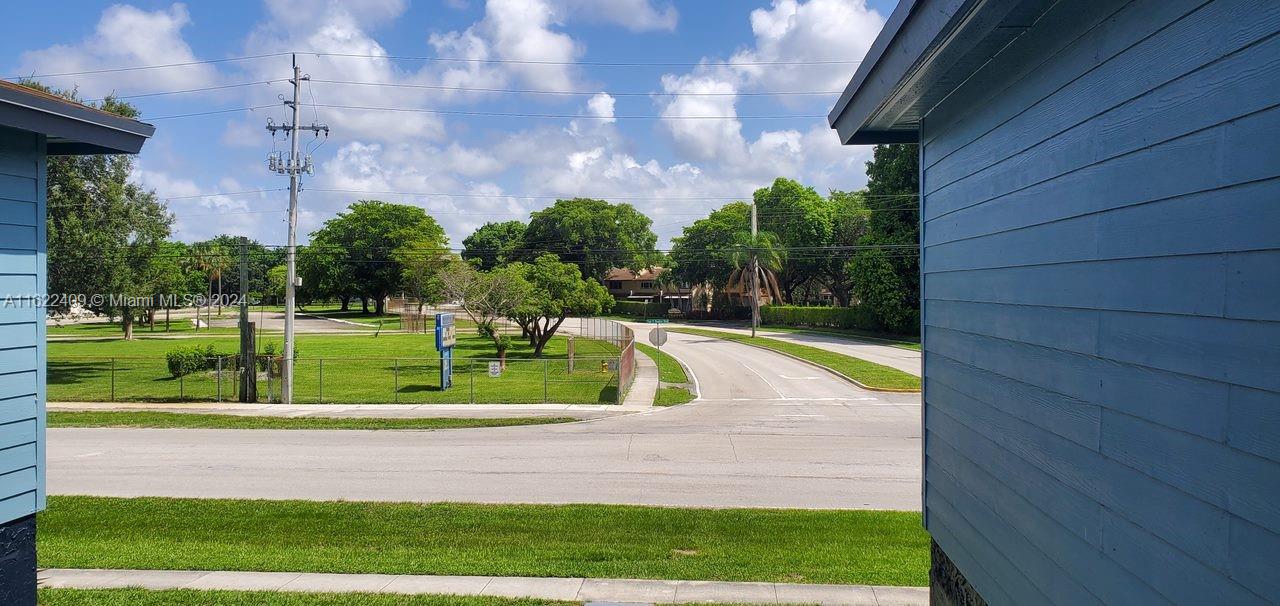 a view of a yard with an outdoor space