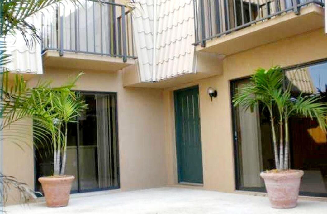 a view of a potted plants in front of a building