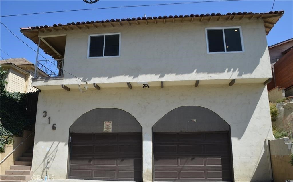 a view of a house with a outdoor space