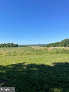 a view of an ocean from a yard