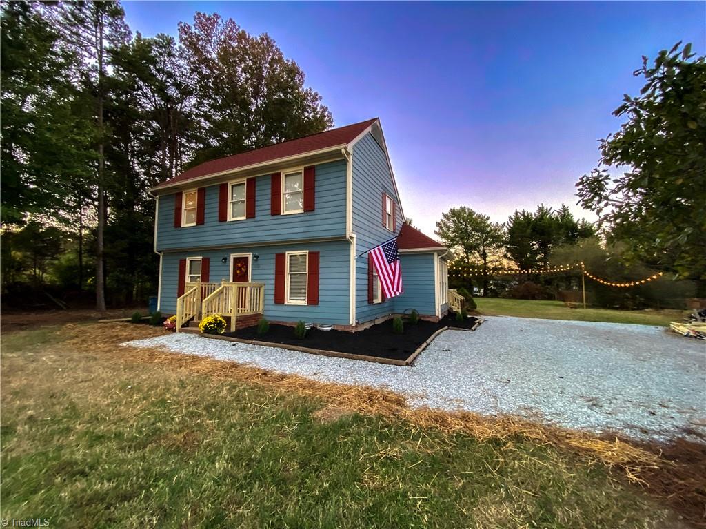 Front of the house at sunset.