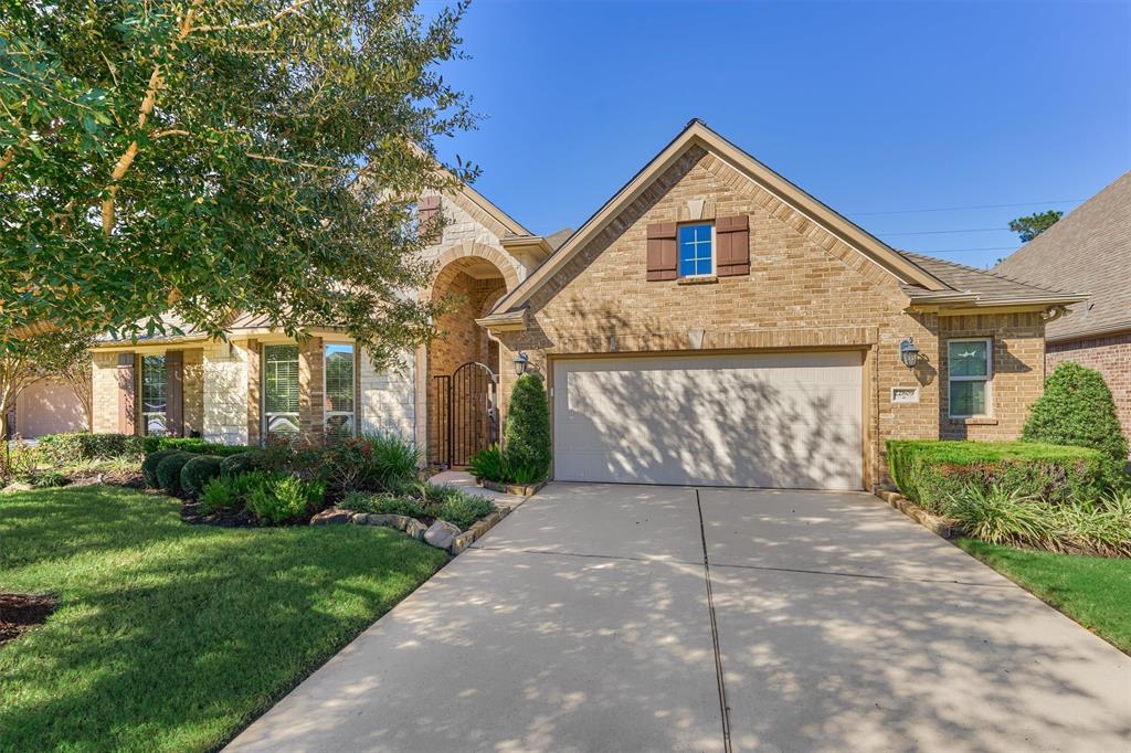 Featuring timeless brick elevation and manicured gardens, 22809 Windward Meadow is the perfect blend of flow and function in sought after Woodridge Forest!  Talking points include WHOLE HOME GENERATOR, recent roof, oversized garage, smart home design, and private, greenbelt lot!