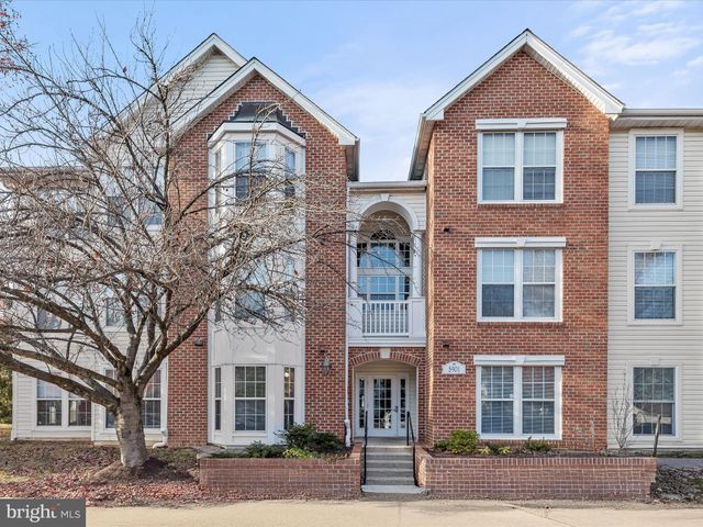 $325,000 | 5901 Millrace Court, Unit H101 | Phelps Luck