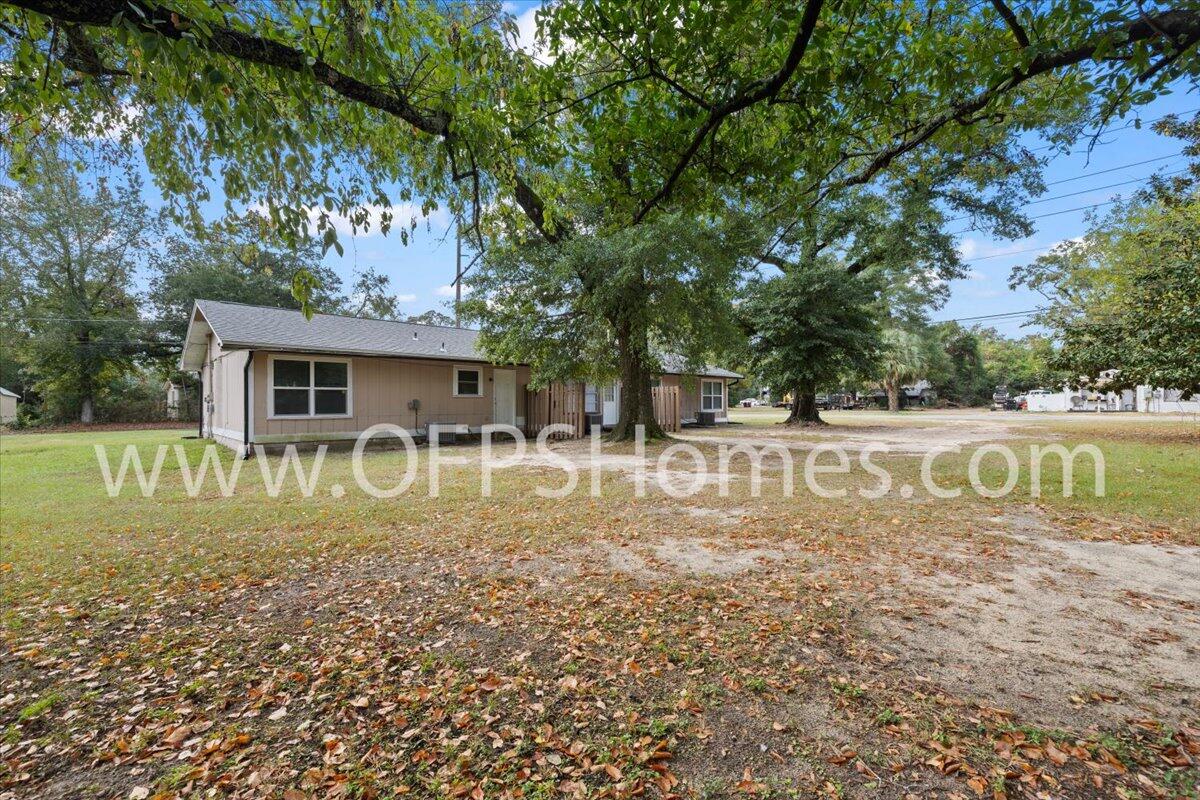 a view of house with outdoor space