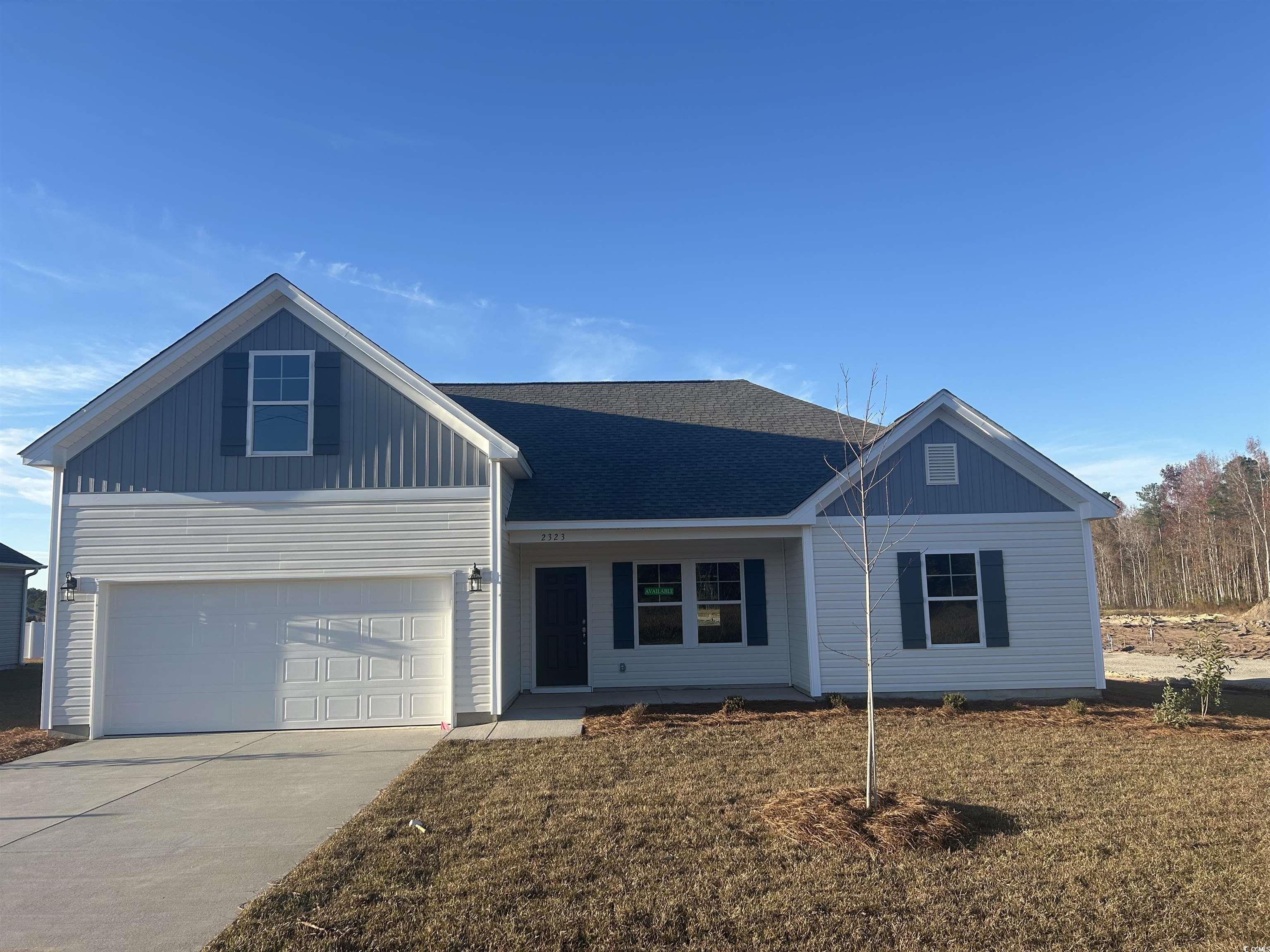 View of front of home featuring a garage