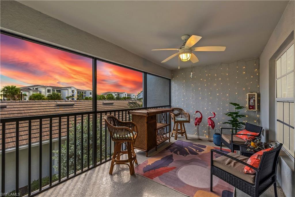 a view of a chairs and tables in a balcony