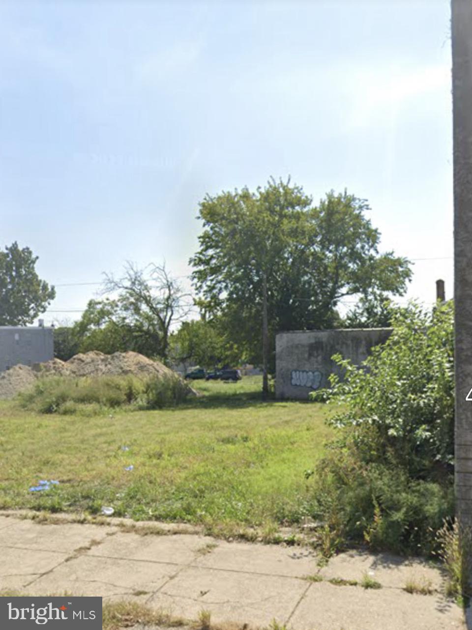 a view of a yard with an outdoor space