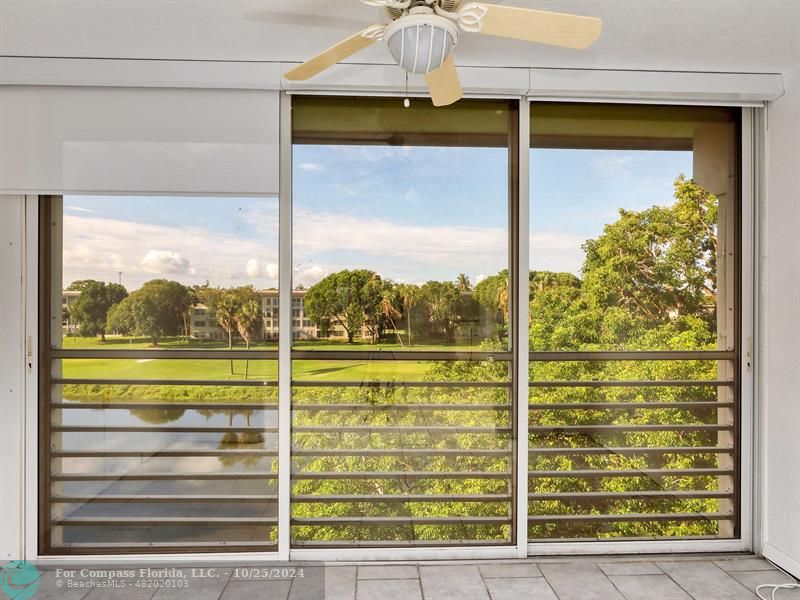 a view of a glass door with a outdoor space