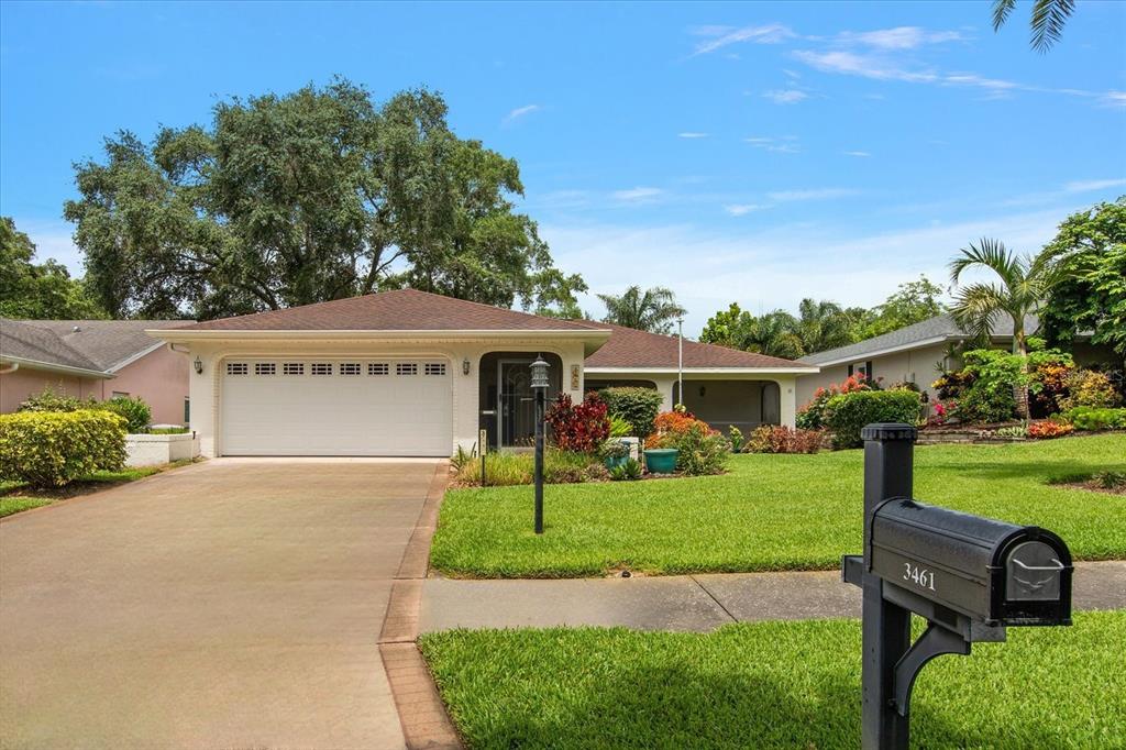 front view of a house with a yard