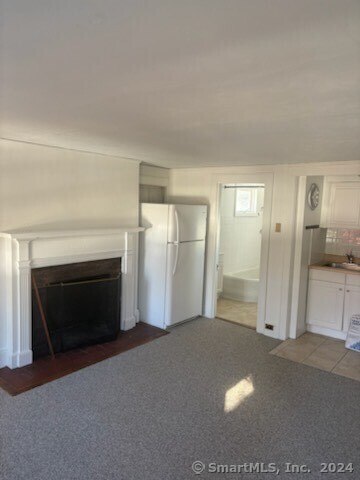 a view of a livingroom with a fireplace