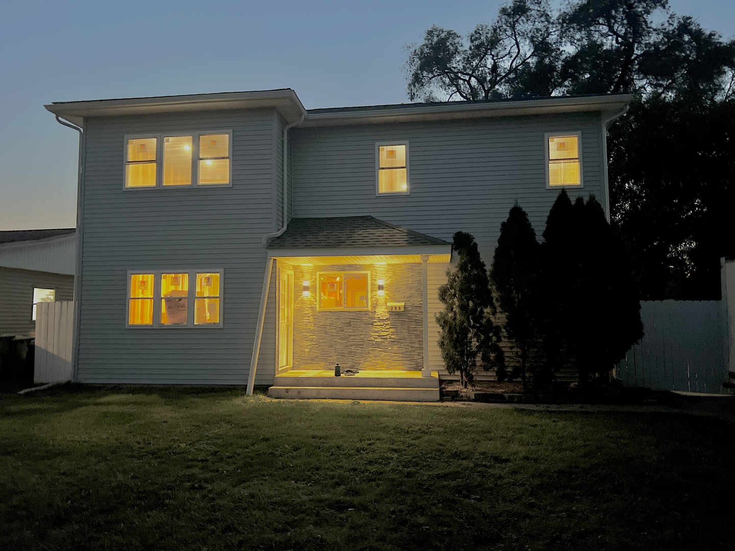 a house view with a garden space