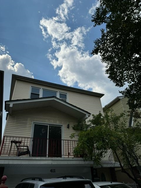 a view of house with outdoor space