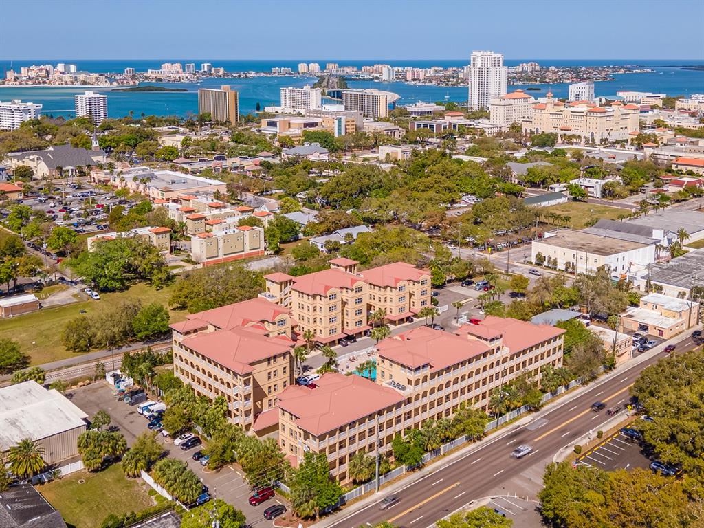 an aerial view of residential houses and city view