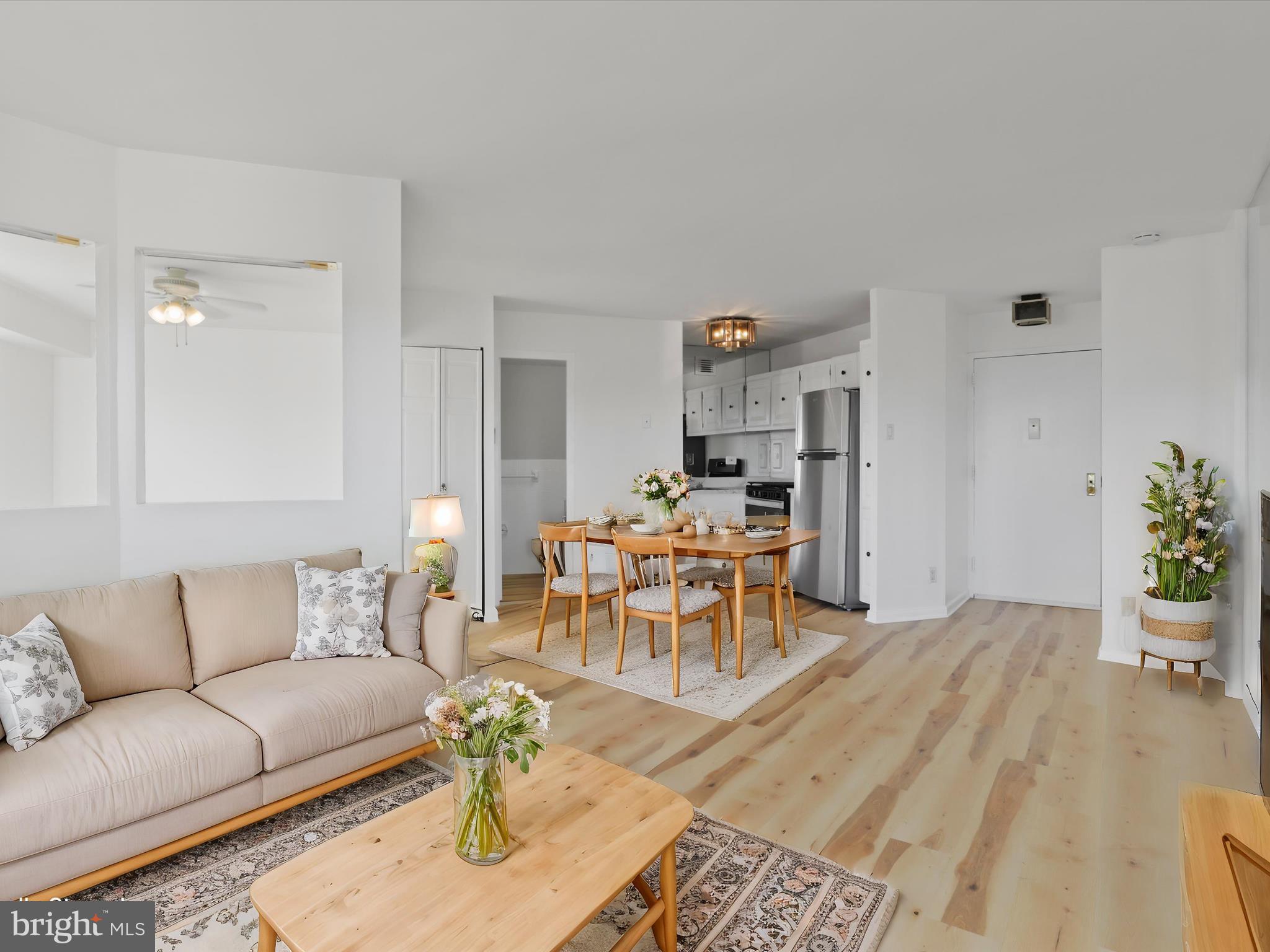 a living room with furniture and a table