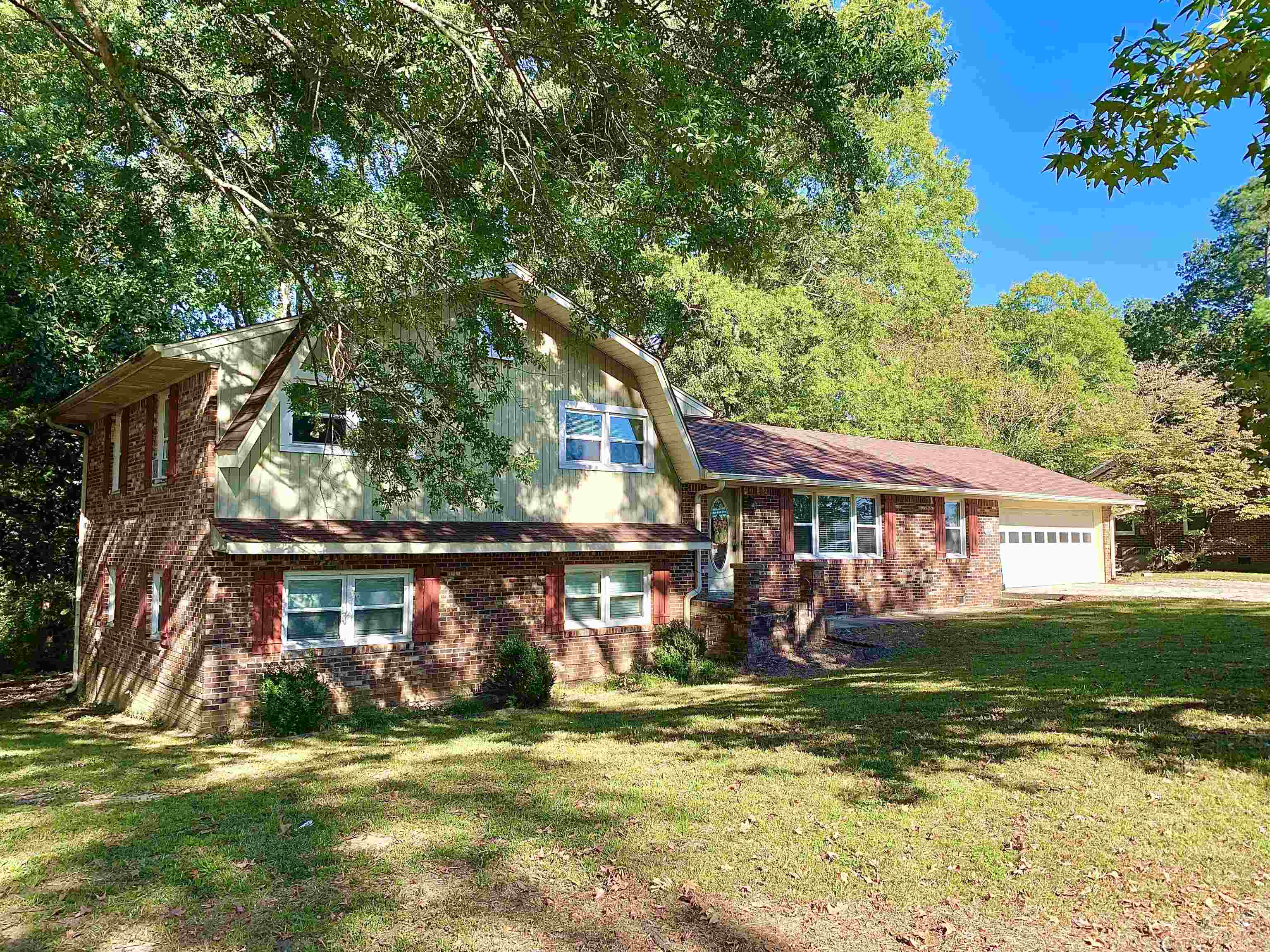 front view of a house with a big yard