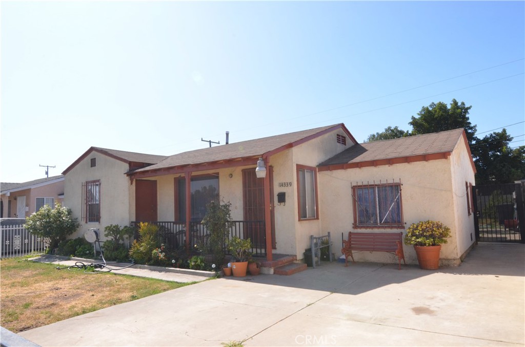 a front view of a house with yard