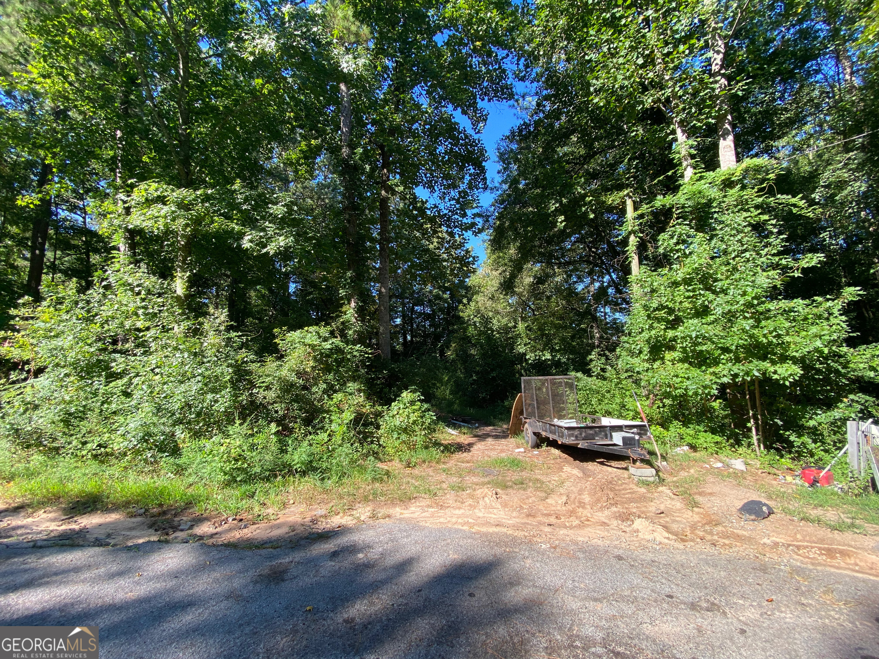 a house with trees in the background