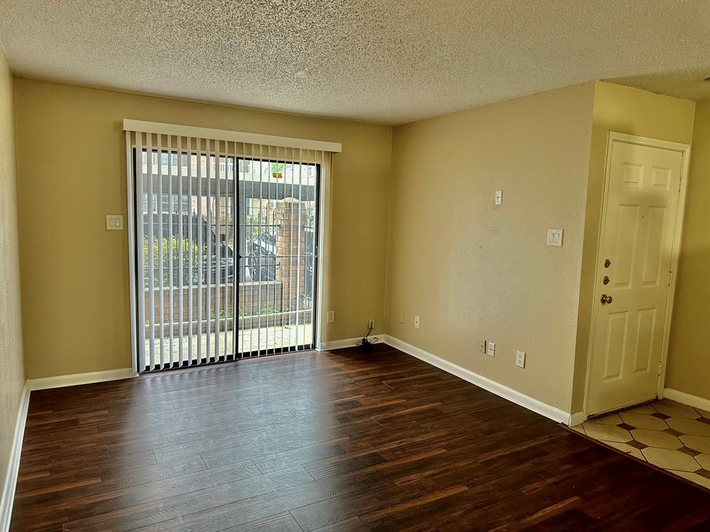 Living area with sliding doors to the patio area